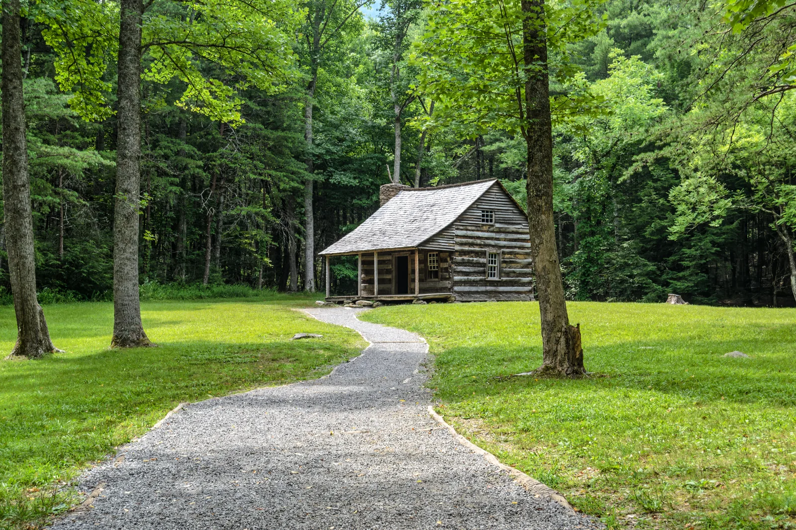 Gravel path leading to the Carter Shields log cabin in Cades Cove