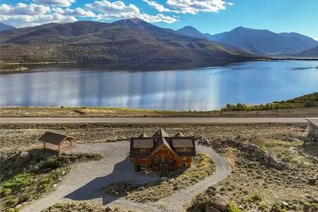 Wide lake and mountain view from above cabin