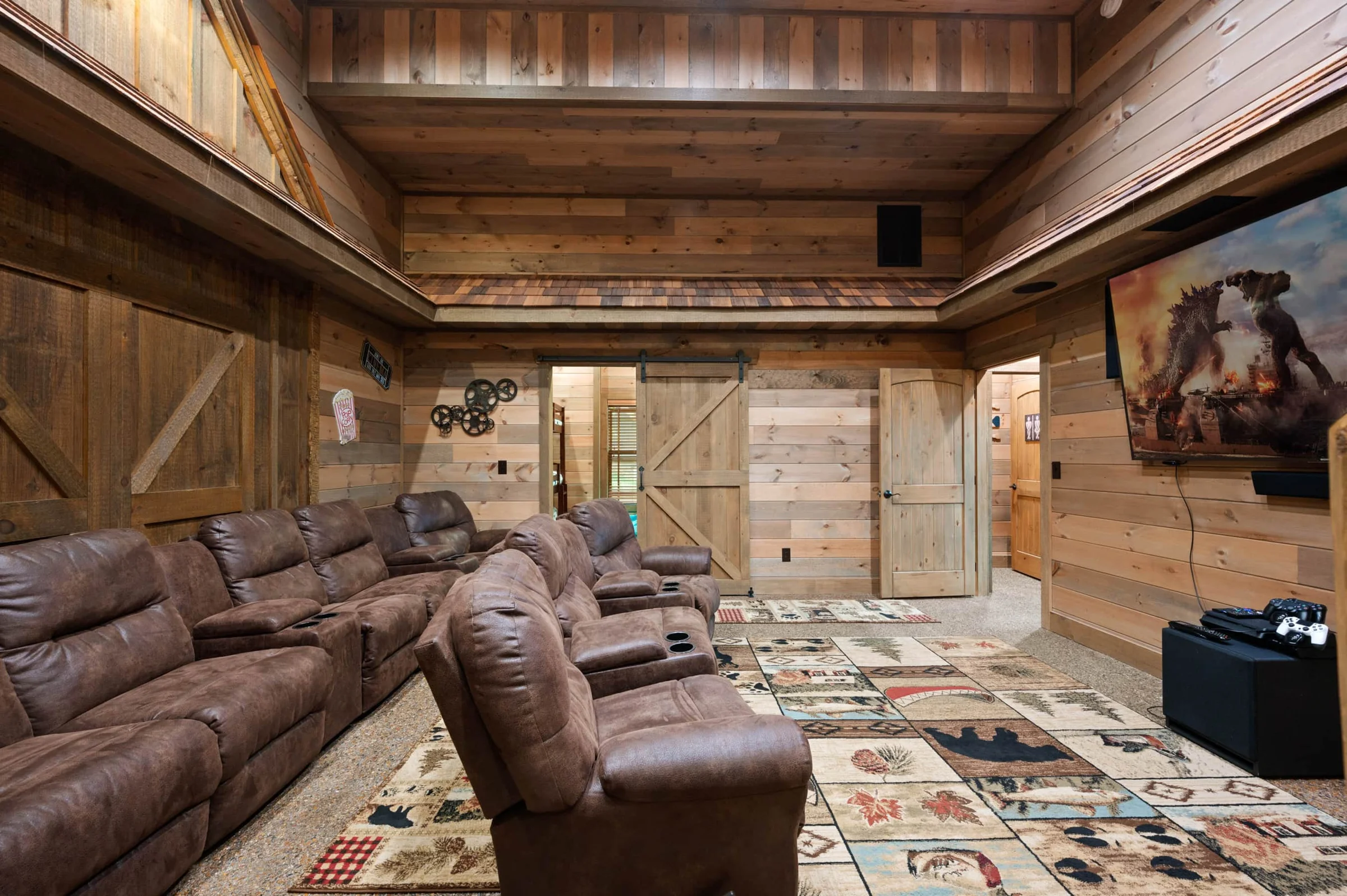 Cozy media room with sectional seating and big TV